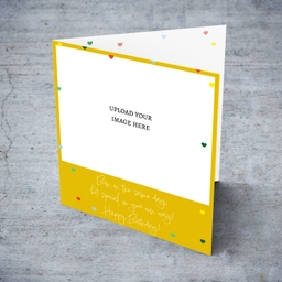 Photo birthday card for twins (unisex & neutral) with a yellow background and scattered hearts in English