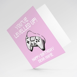 Game console in pixellated text, pink background birthday card in English (Personalisable)