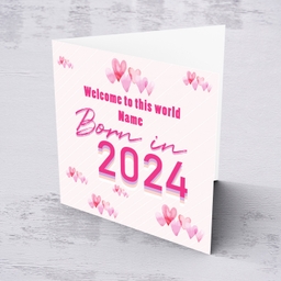 Born in 2024 card for new born girl with scattered pink hearts in English (PErsonalisable)