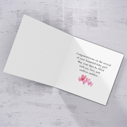 Born in 2024 card for new born girl with scattered pink hearts in English (PErsonalisable)