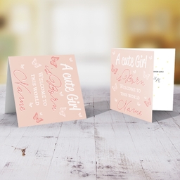 A cute baby girl is born - New born greeting card for girls in light pink background and scattered butterflies in English