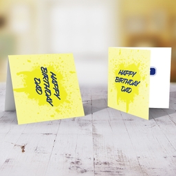 Yellow splattered paint background with blue text birthday card for Dad in English