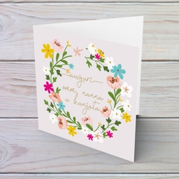 Colourful floral themed birthday card with light pink background for mother, grandma and mother-in-law in Maltese