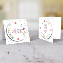 Cute bunny Easter card with colourful text and polka dotted background in Maltese