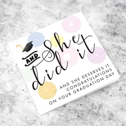 You did it and he deserve it - Graduation card with blue and green designs and graduation hat in English (Female)