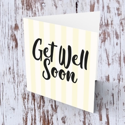 Off white and light yellow striped background get well soon card in English