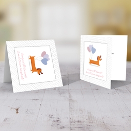 First mother's day card with cute sausage dog with 3 heart balloons in Maltese