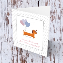 First mother's day card with cute sausage dog with 3 heart balloons in Maltese