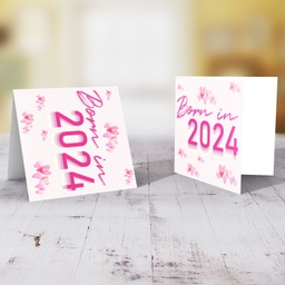 Born in 2024 card for new born girl with scattered pink hearts in English