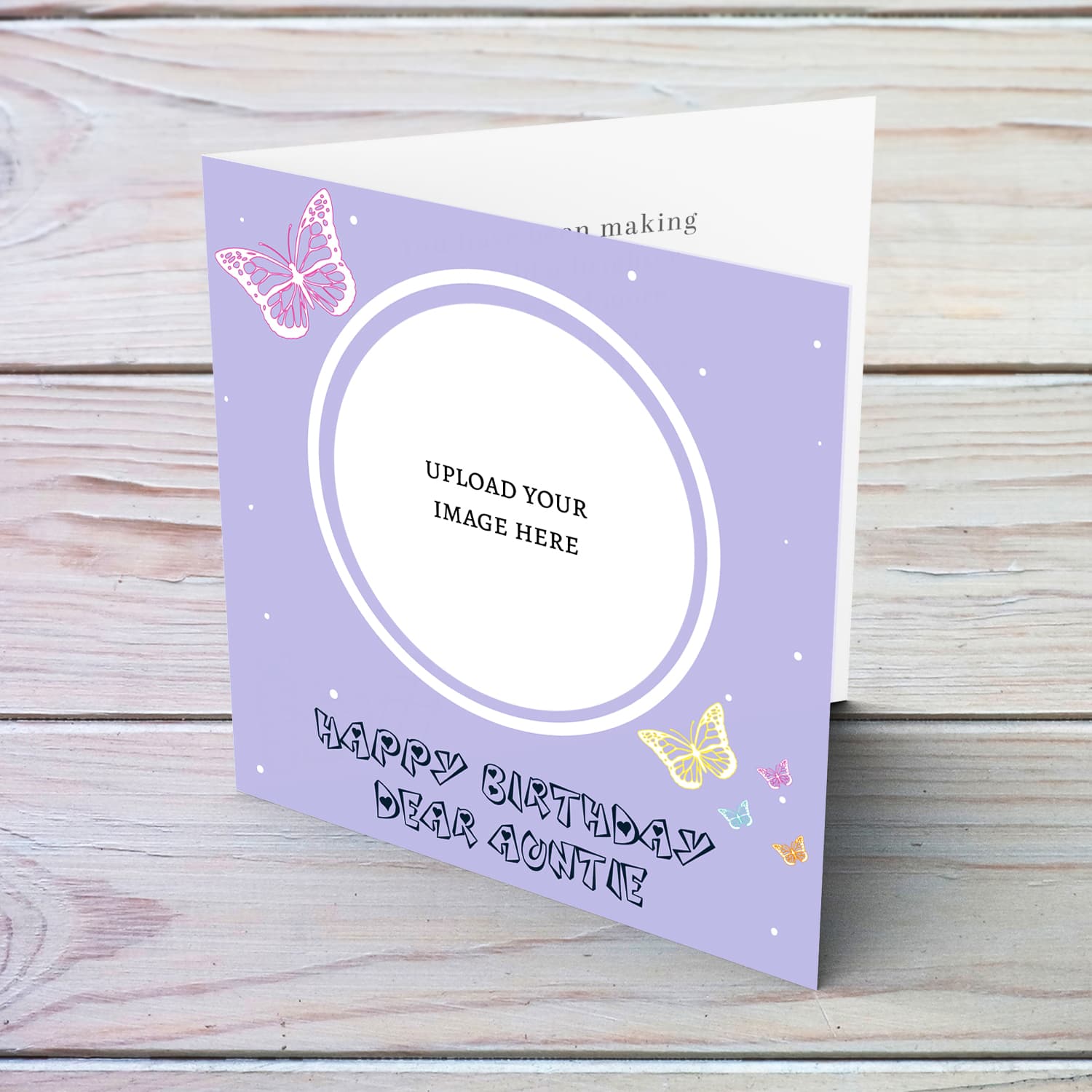 A cute photo birthday card for Auntie in a light purple background with colourful butterflies in English