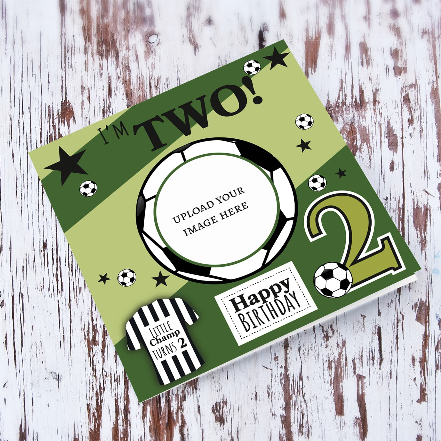 A cute football themed photo birthday card for a 2 year old boy, featuring a green themed background, with scattered footballs in English 