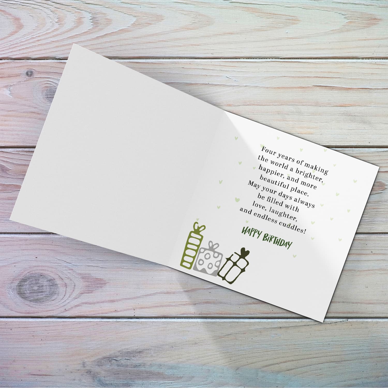 A cute football themed photo birthday card for a 4 year old boy, featuring a green themed background, with scattered footballs in English