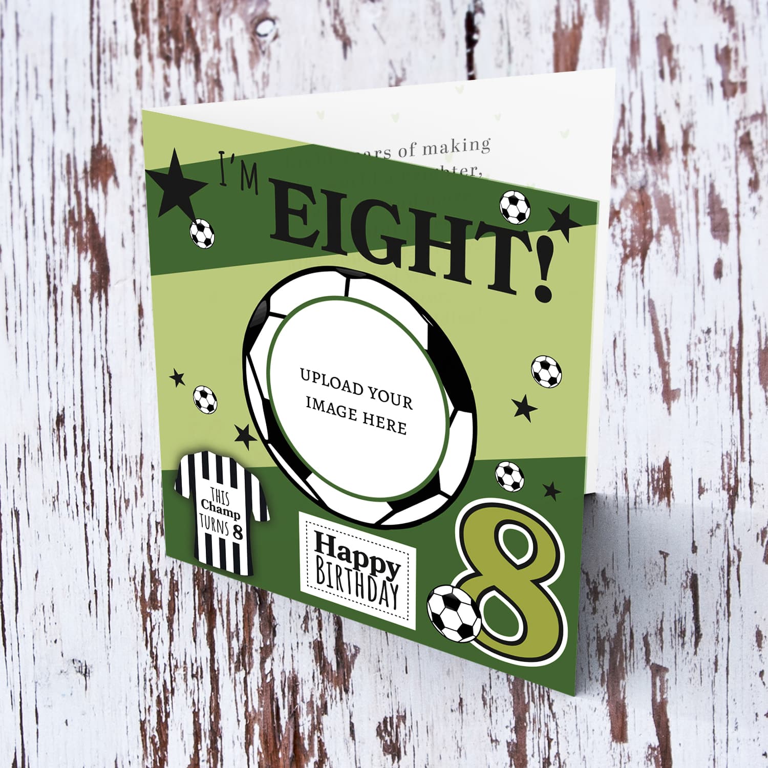 A cute football themed photo birthday card for an 8 year old boy, featuring a green themed background, with scattered footballs in English