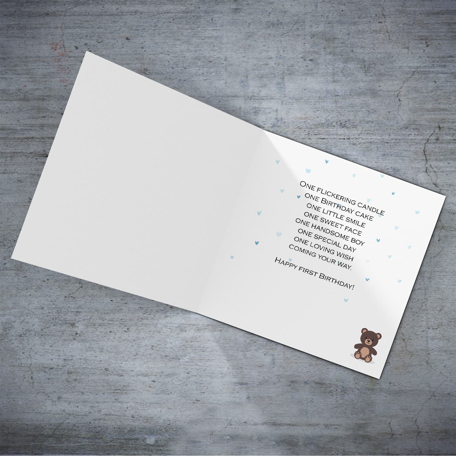 A cute bear themed first birthday card for cousin (boy) in a neutral background in English