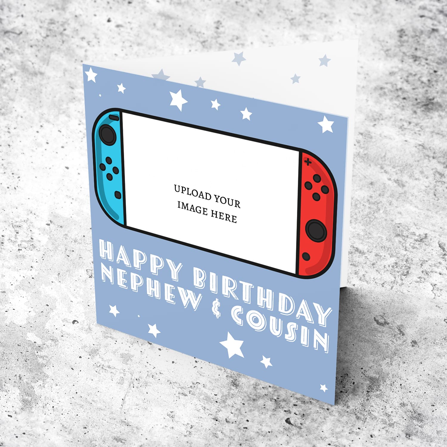 A photo birthday card for nephew & cousin featuring a nintendo cartoon design, in a light blue background with scattered white stars in English