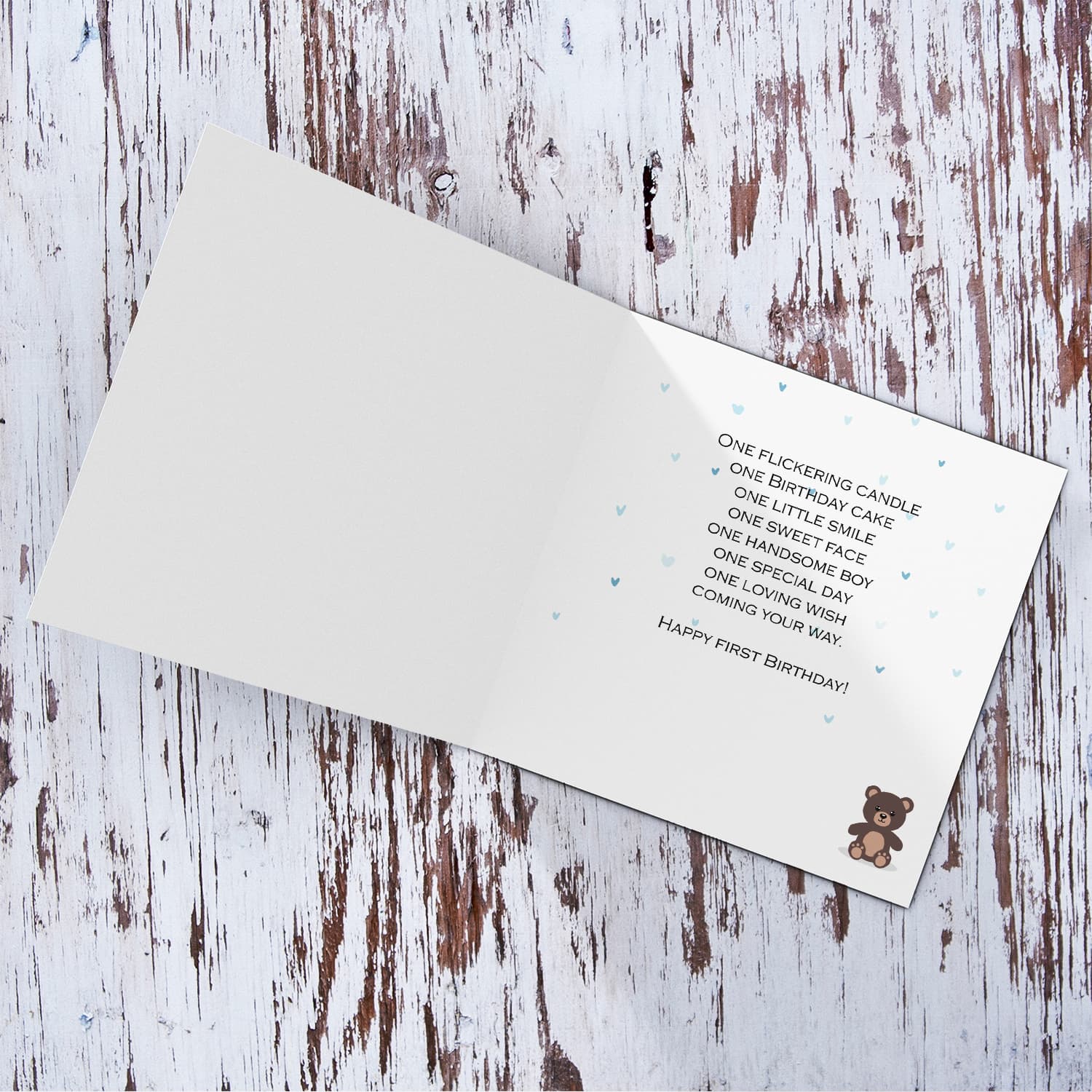 A cute bear themed first birthday card for nephew & cousin in a neutral background in English