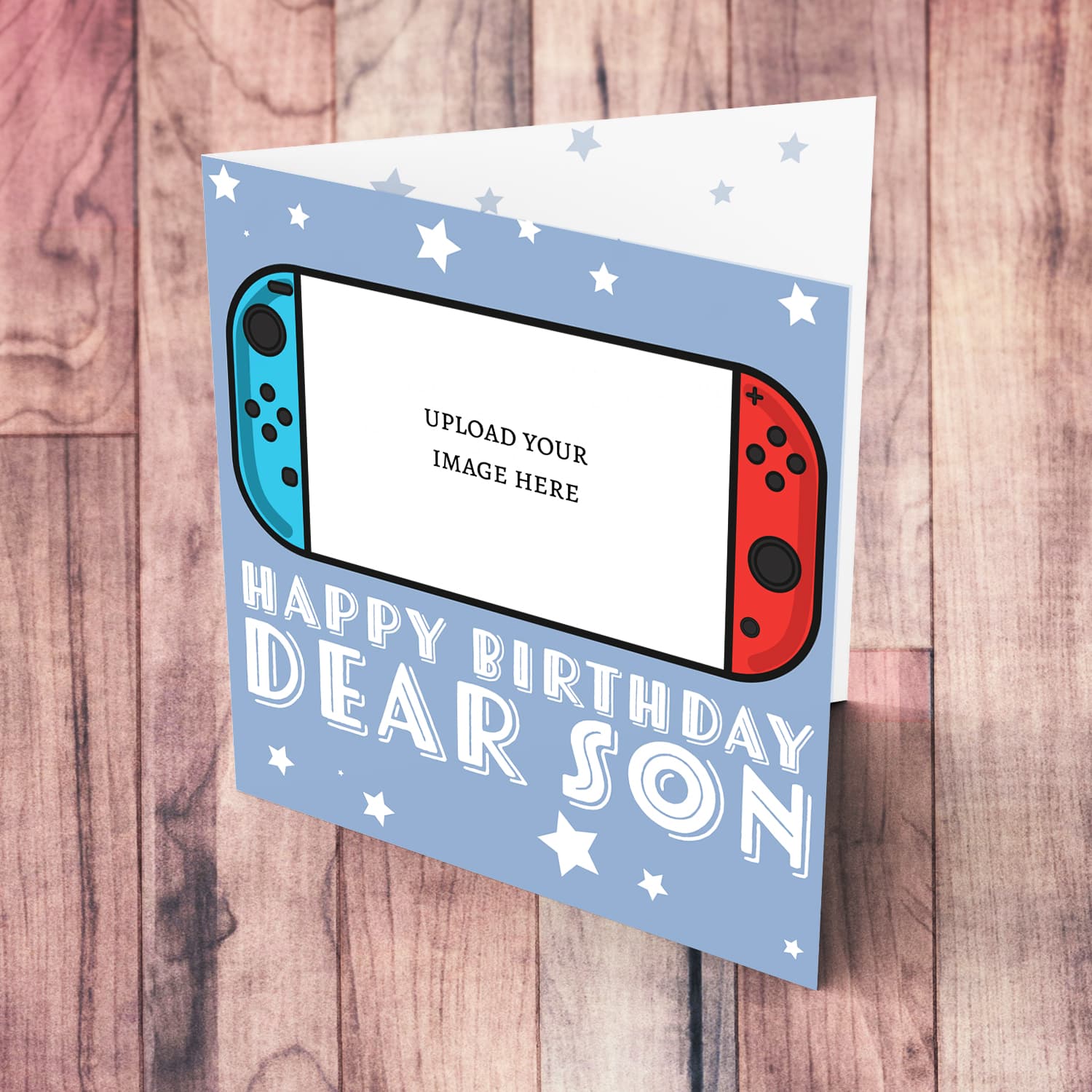 A photo birthday card for son featuring a nintendo cartoon design, in a light blue background with scattered white stars in English