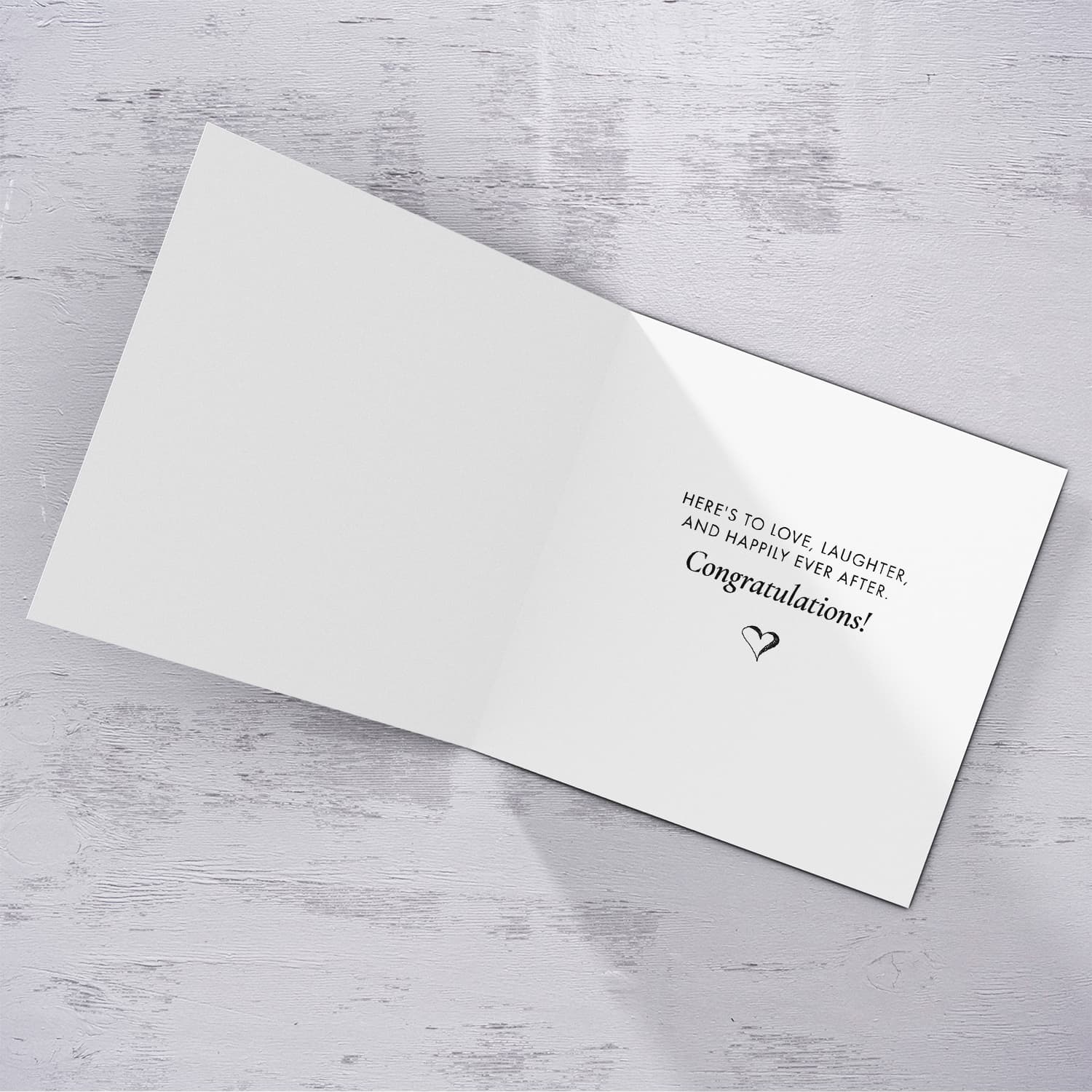 A minimalist photo card for Mr & Mr with dainty florals and light cream background in English