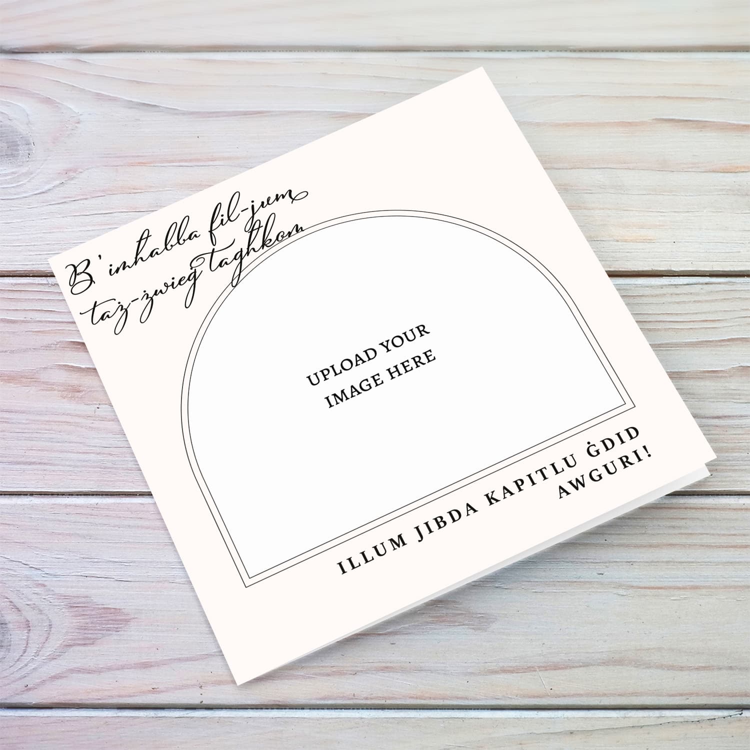An elegant photo wedding card in a light coloured background and black text in Maltese