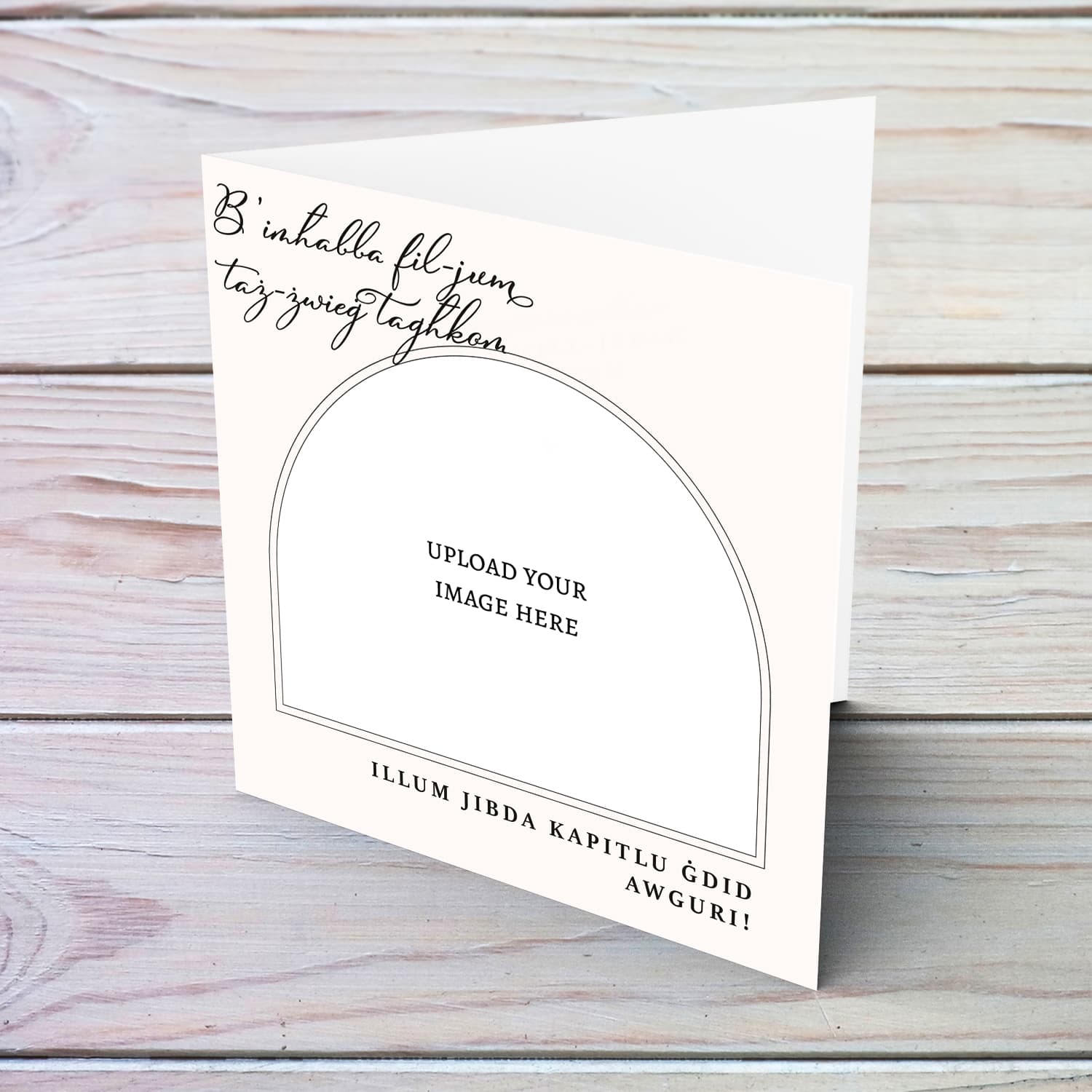 An elegant photo wedding card in a light coloured background and black text in Maltese
