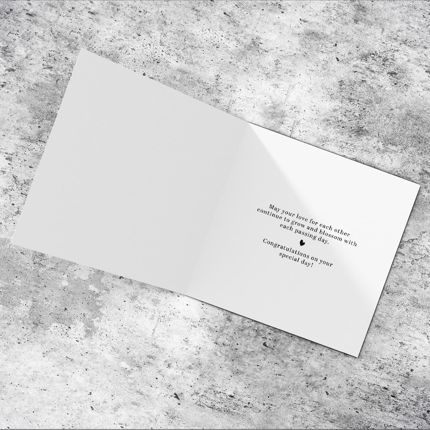 A minimalist Wedding photo card, in a light background, black text and heart in English