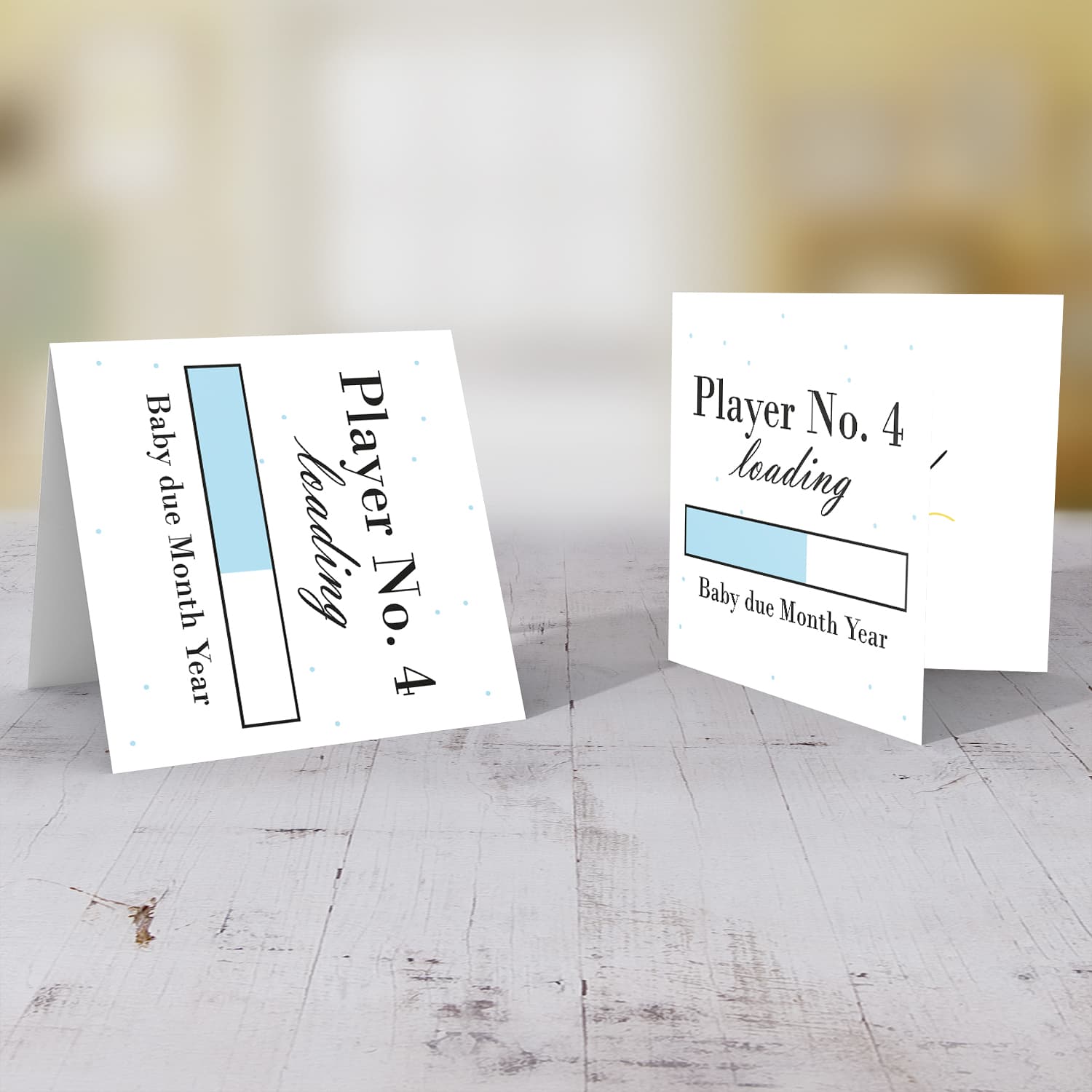Baby Loading Player No 4 themed (in light blue) baby/pregnancy announcement personalisable card in English