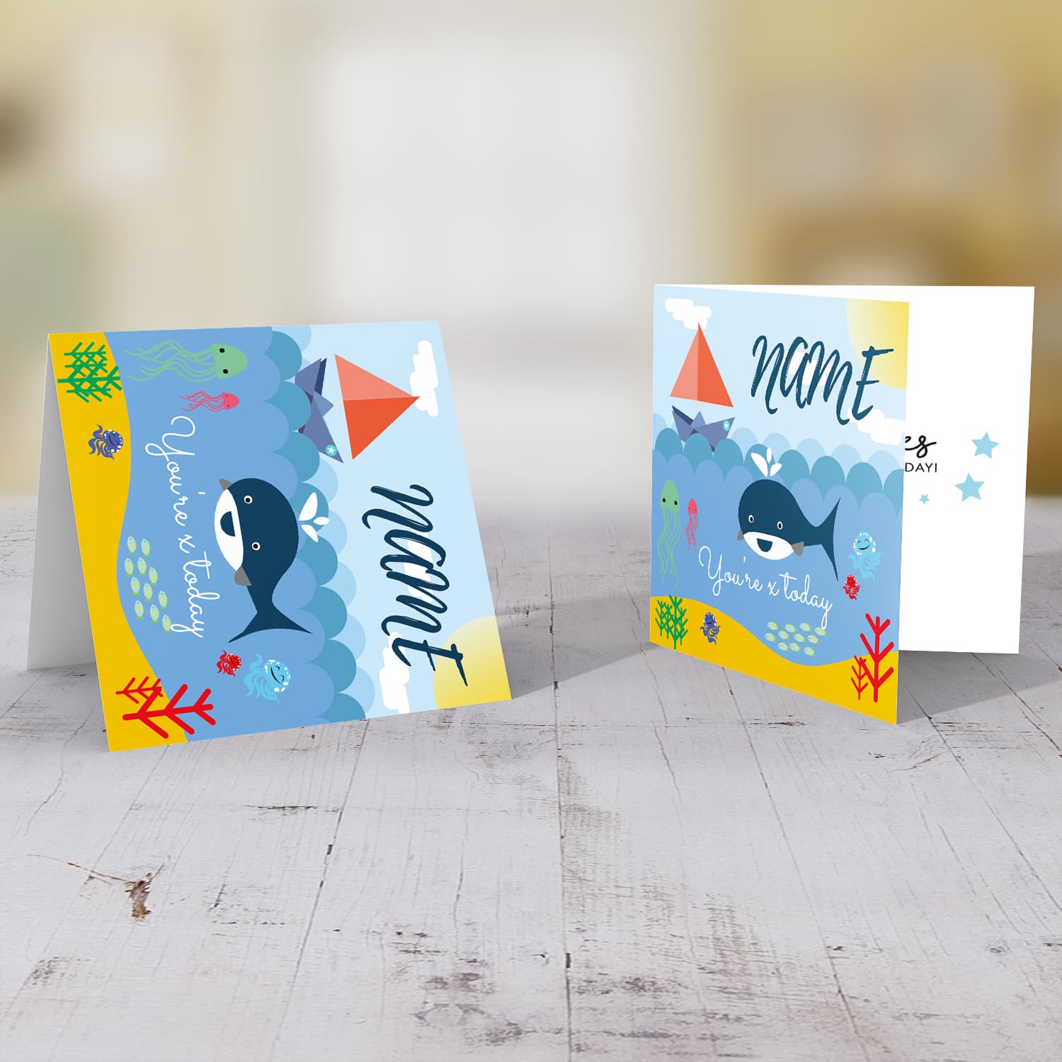 Underwater sea themed birthday card with whale, jellyfish, fish, octopus and sailing boat in English