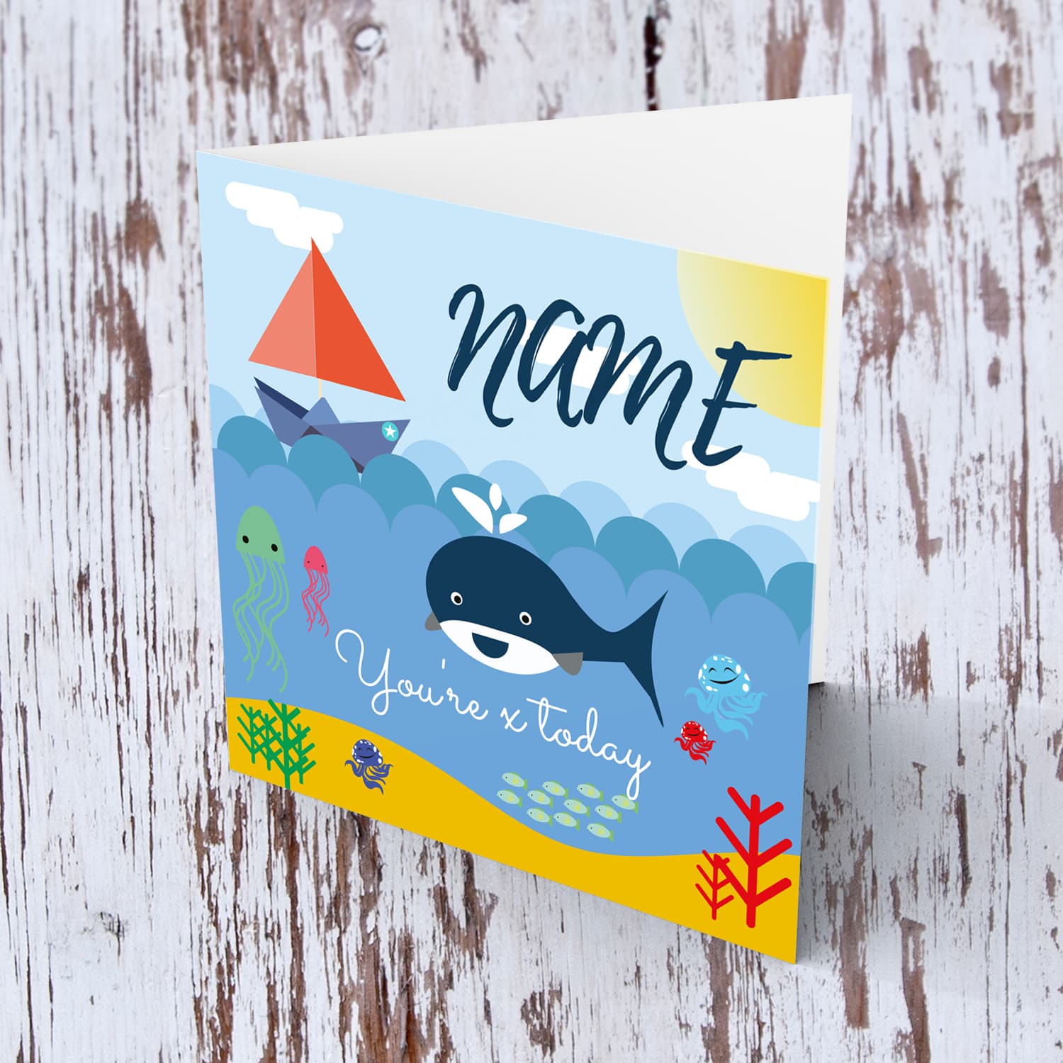 Underwater sea themed birthday card with whale, jellyfish, fish, octopus and sailing boat in English