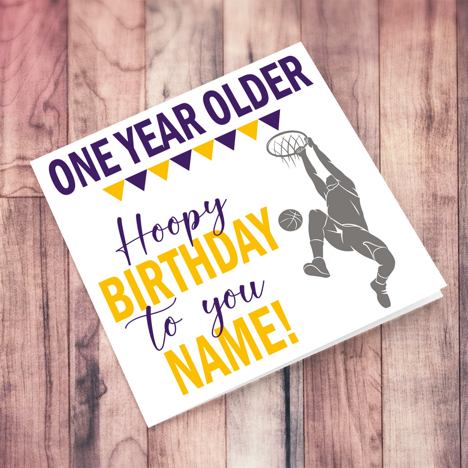 A basketball themed birthday card in yellow and purple colours in English (Unisex & Personalisable)
