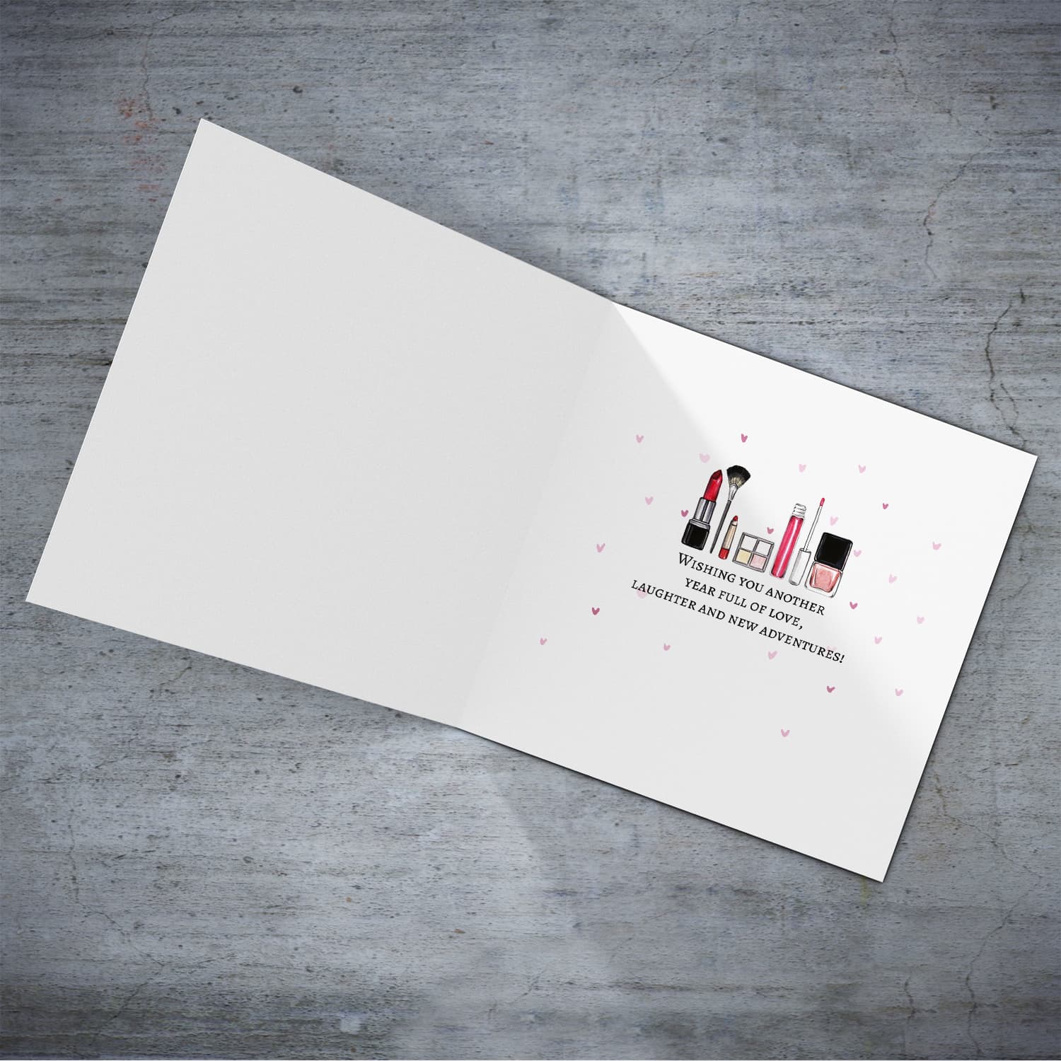 A beautiful make up themed birthday card, featuring a black and white striped bag including various florals in English (Enter Age & Personalisable)