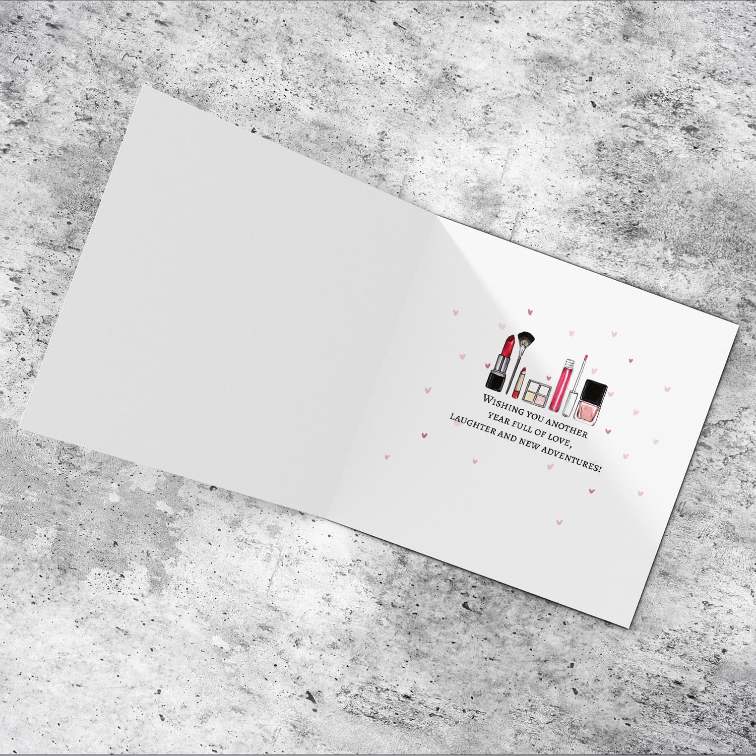 A beautiful make up themed birthday card, featuring a black and white striped bag including various make up brushes in English (Enter Age & Personalisable)