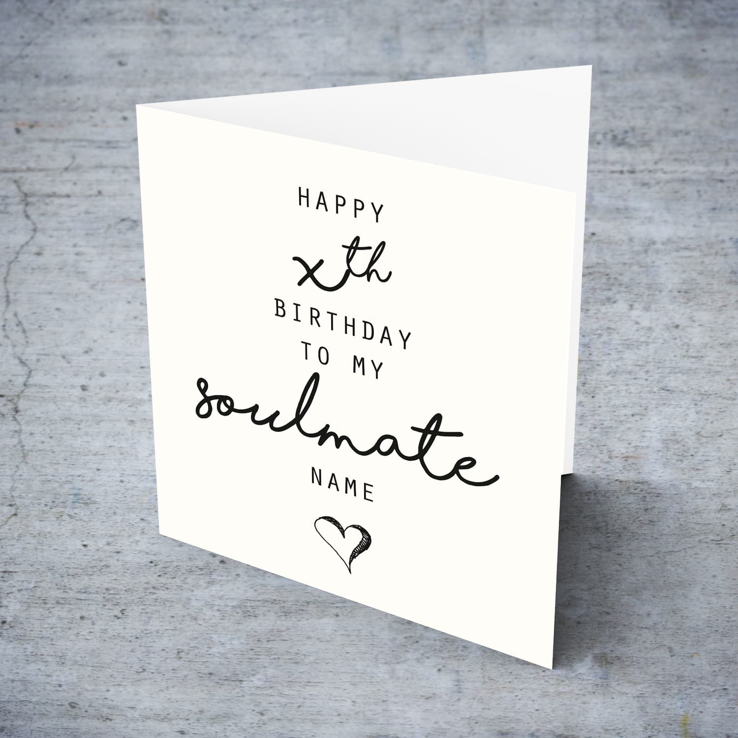A minimalist birthday card - to my soulmate featuring a black heart in English  (Personalisable)