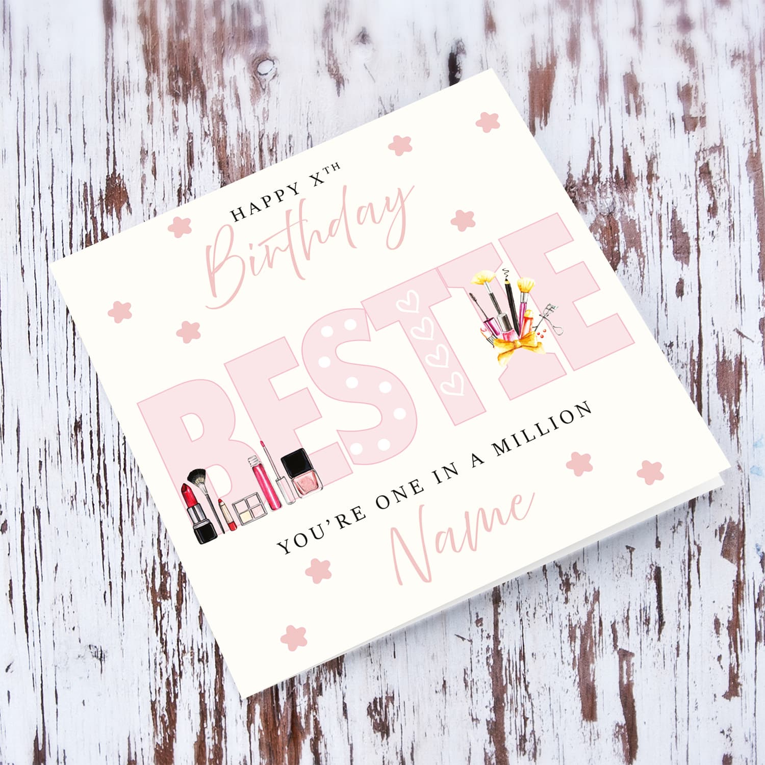 A beautiful birthday card for your BESTIE / Best Friend in big light pink font featuring make up & hearts in English (Personalisable)