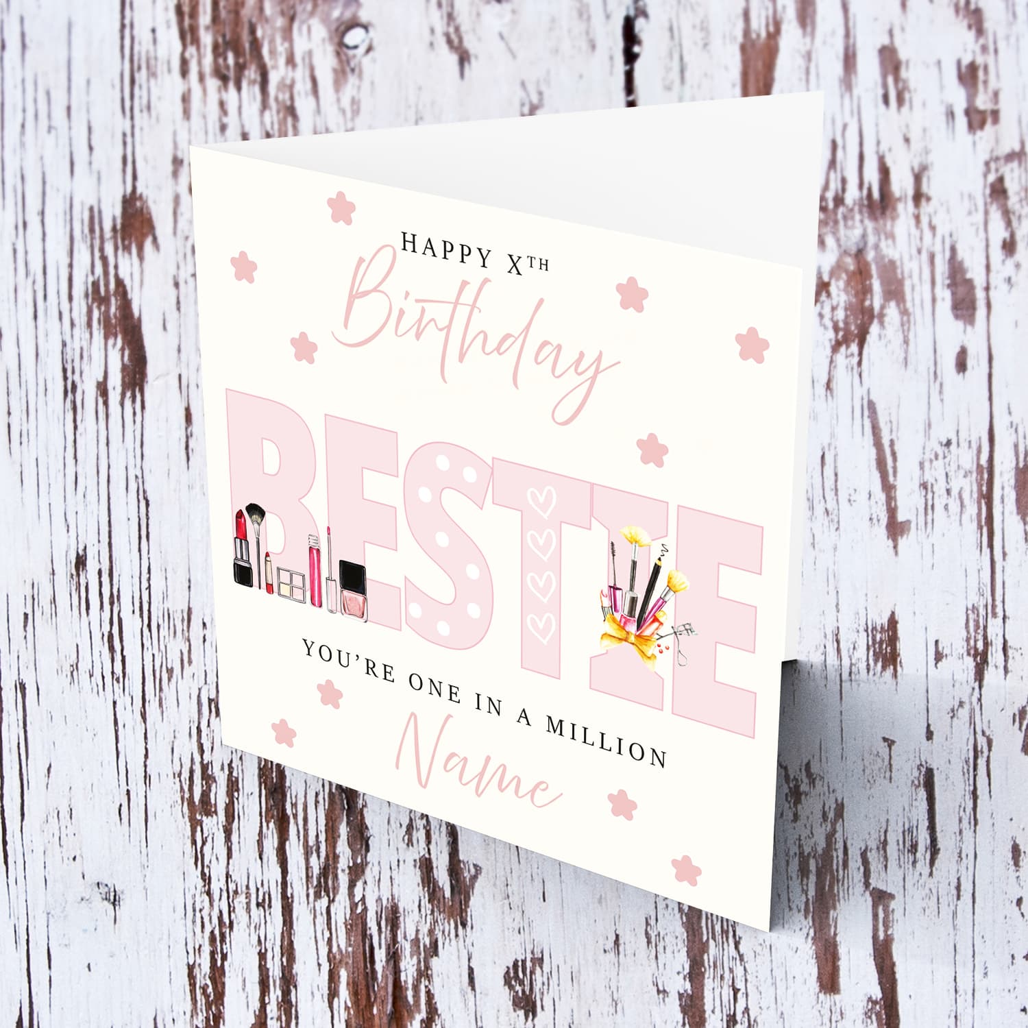 A beautiful birthday card for your BESTIE / Best Friend in big light pink font featuring make up & hearts in English (Personalisable)
