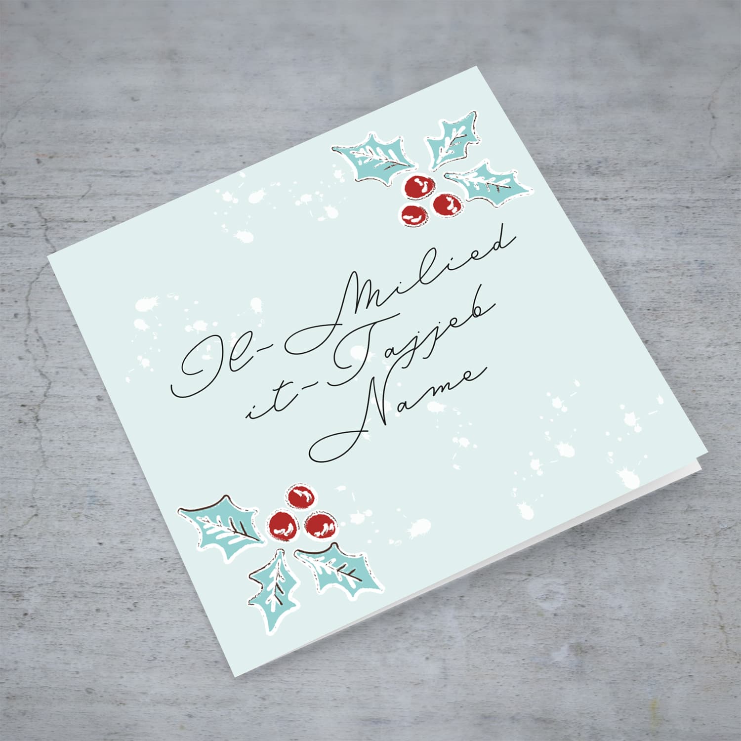 Christmas holly, scattered snow, and light background open Christmas personalisable card in Maltese