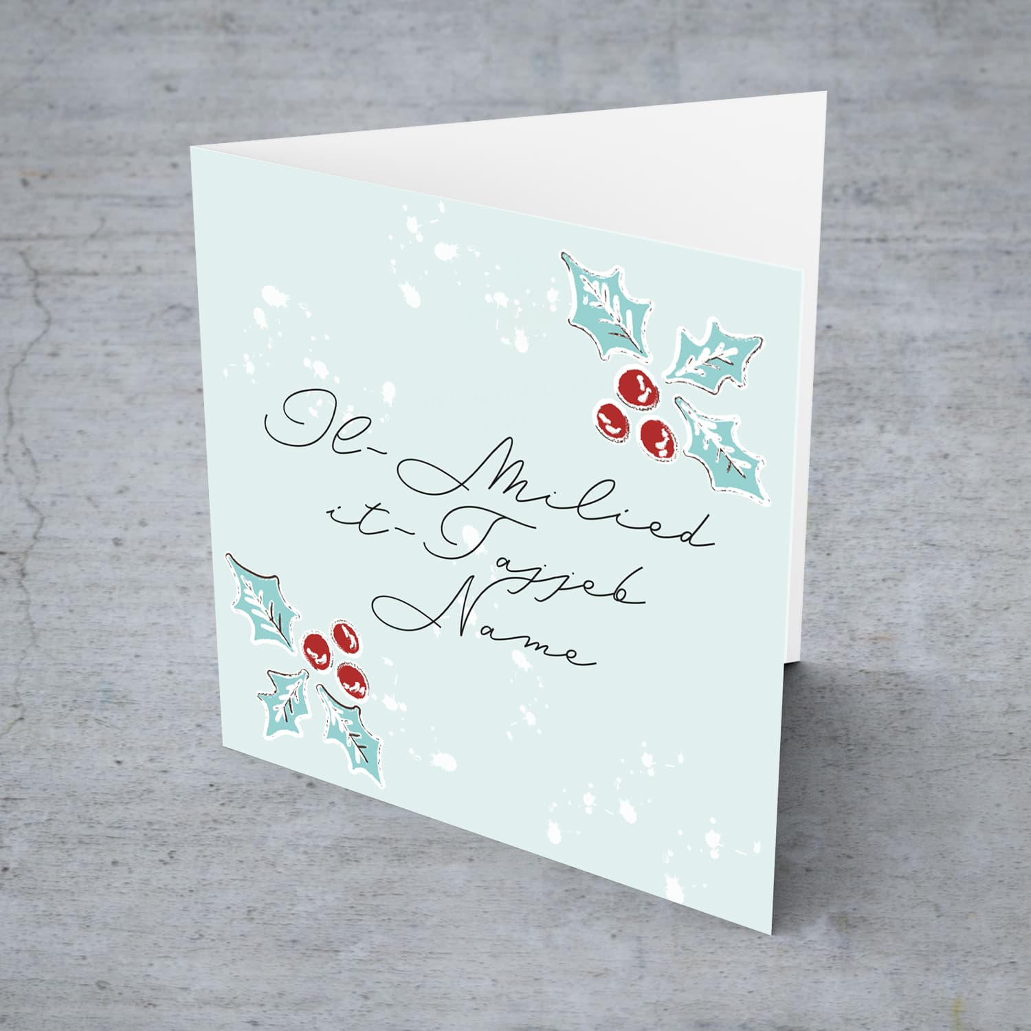 Christmas holly, scattered snow, and light background open Christmas personalisable card in Maltese