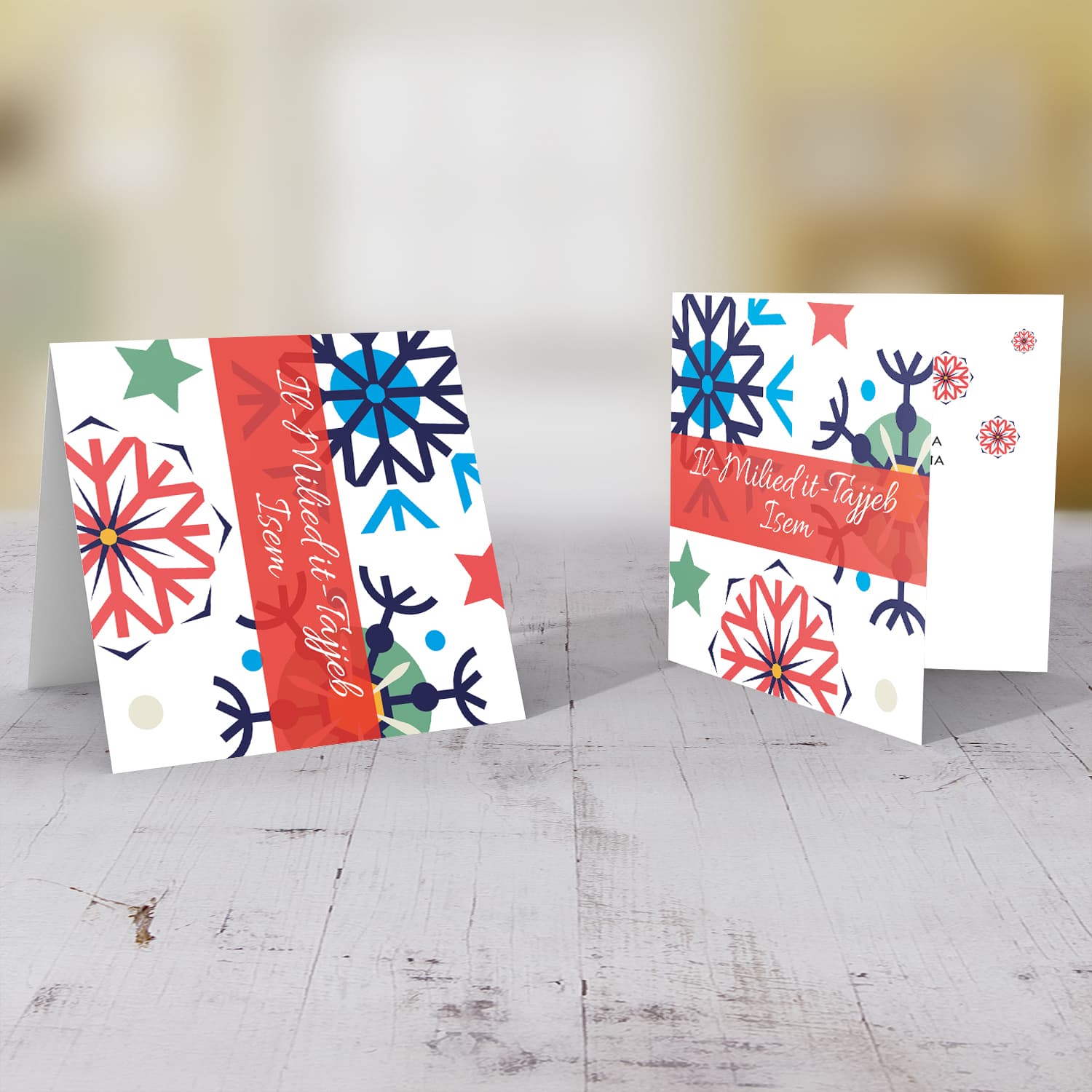 Colourful snowflakes with blue tones Christmas personalisable card for in Maltese