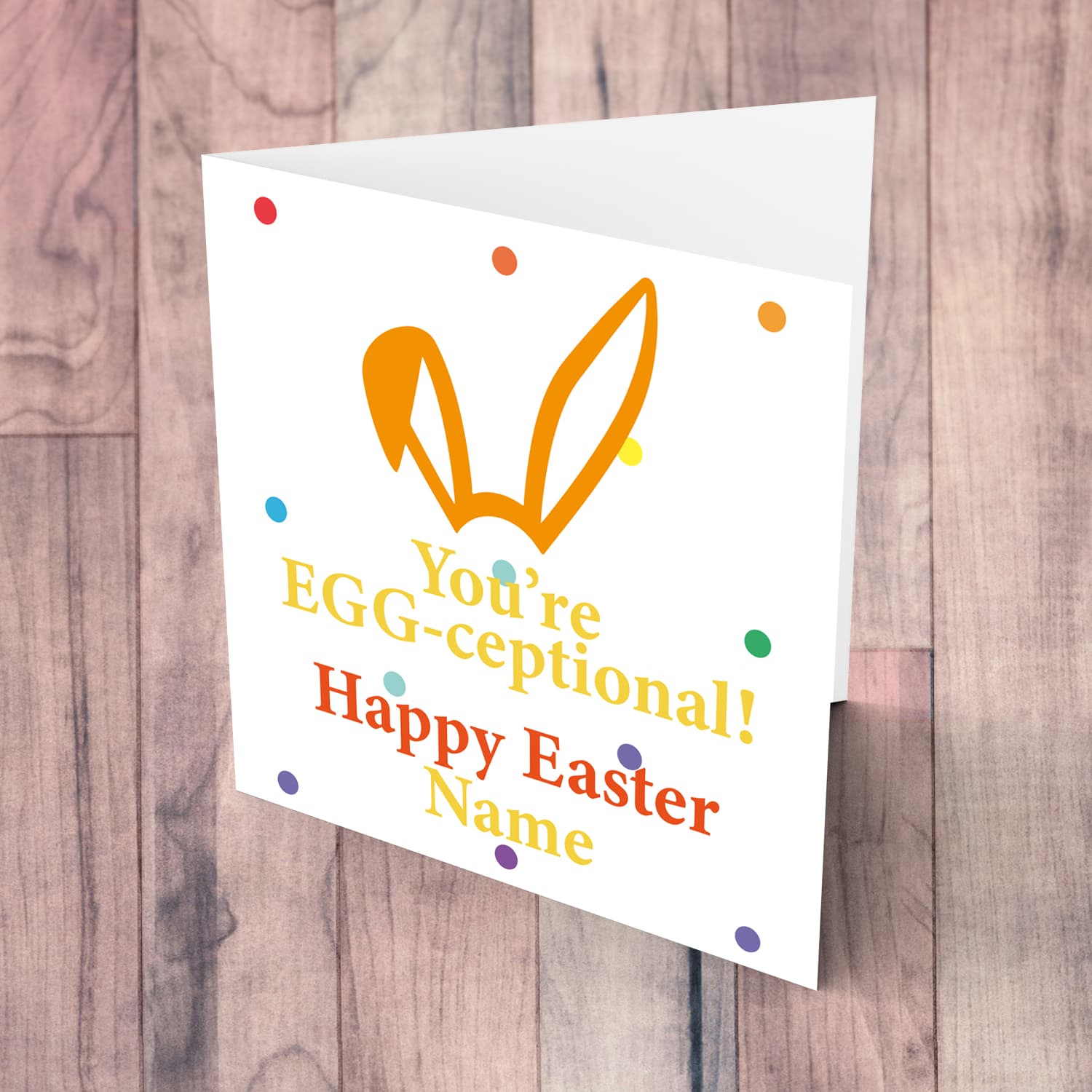 Colourful bunny ears personalisable Easter card with colourful dots in the background in English