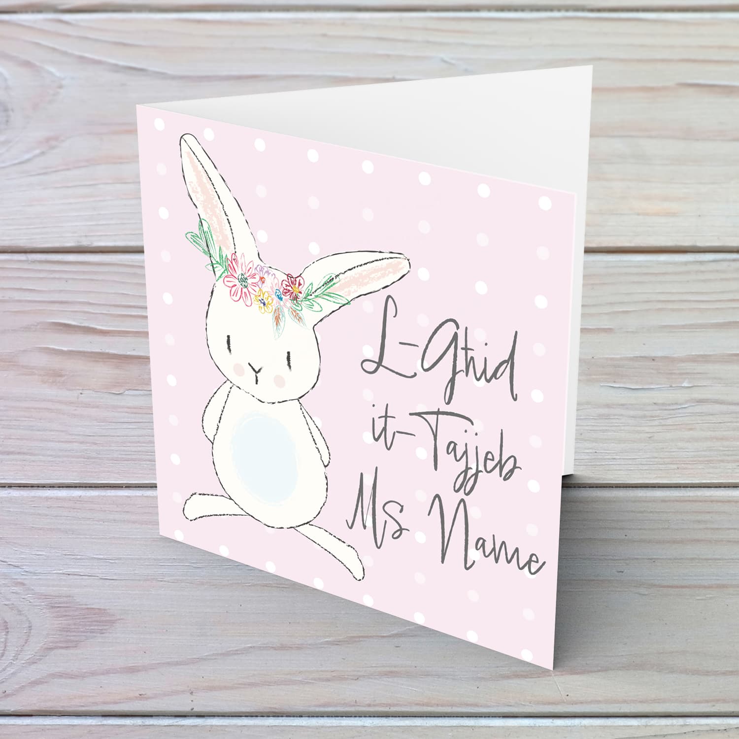 Bunny themed Easter personalisable card for teacher in Maltese with pink background and white polka dots