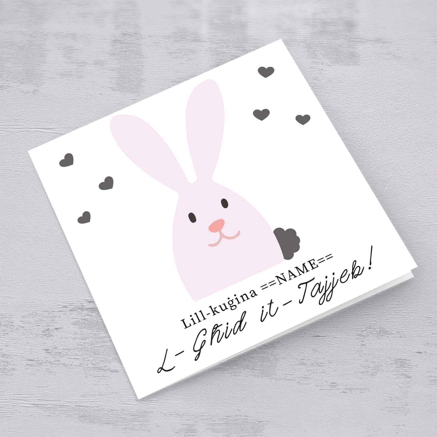Cousin Easter personalisable card with cute pink bunny and scattered hearts in Maltese