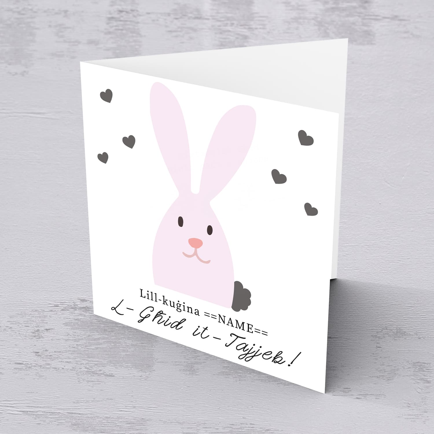Cousin Easter personalisable card with cute pink bunny and scattered hearts in Maltese