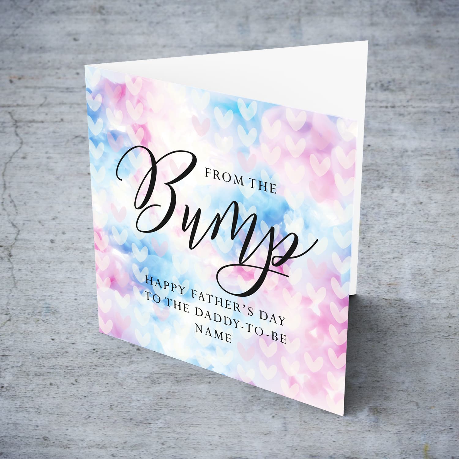 A cute father's day card for the daddy to be from the bump, featuring a colourful two toned background with scattered hearts in English (Personalisable) 