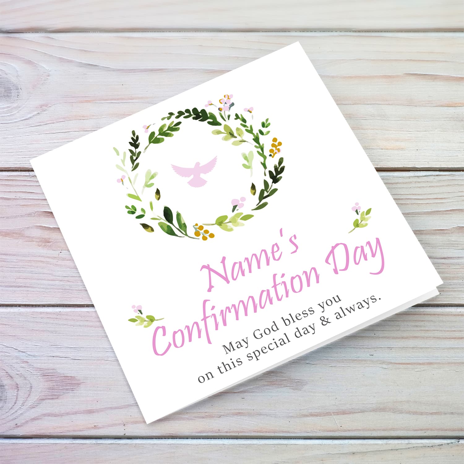 A confirmation card for girls featuring a floral wreath with pink and gold toughes and with the Holy Spirit in English (Personalisable)