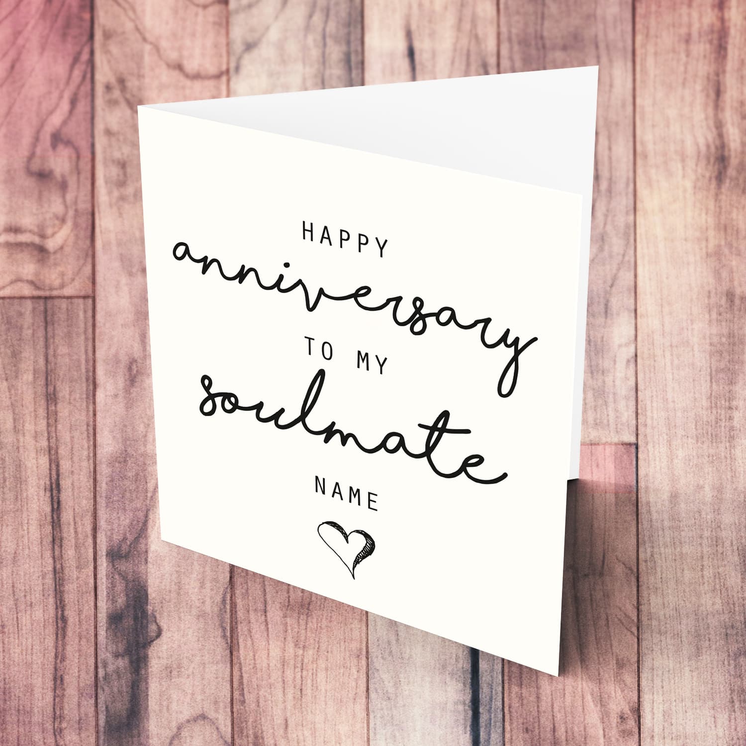 A minimalist anniversary card - to my soulmate featuring a black heart in English  (Personalisable)