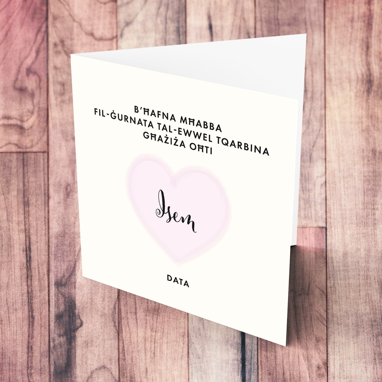 A minimalist Holy Communion card for Sister featuring a light pink heart in Maltese (Personalisable)