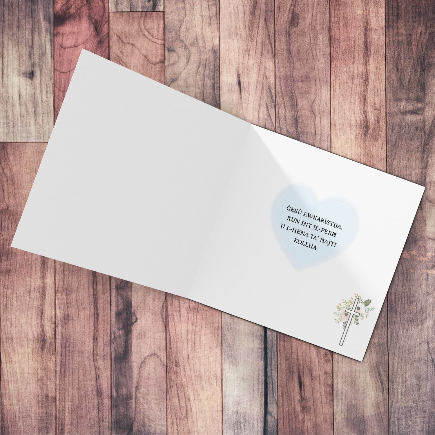 A minimalist Holy Communion card for Nephew featuring a light blue heart in Maltese (Personalisable)