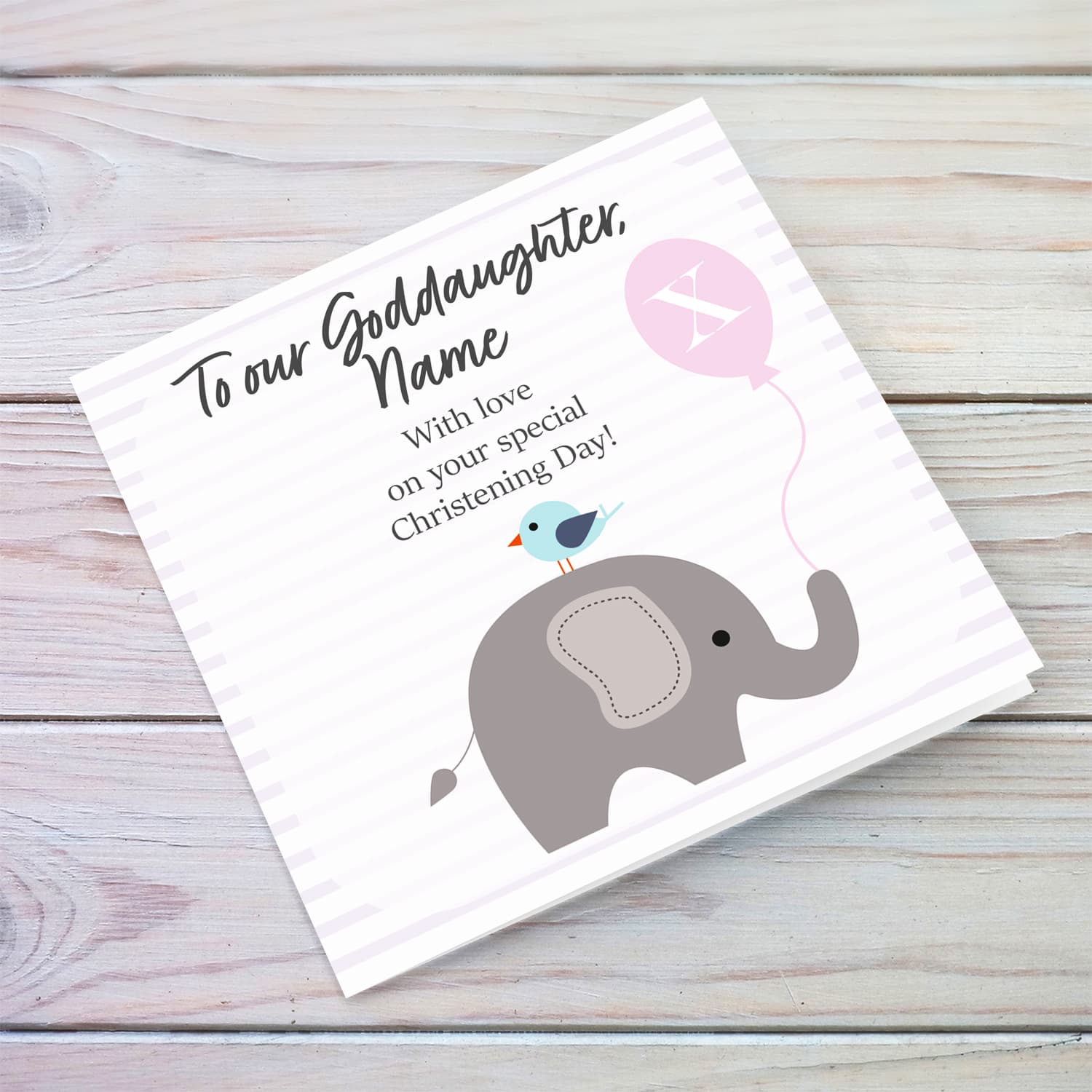 Elephant with bird holding pink balloon, with striped background baptism card for Goddaughter in English (Plural & Personalisable)