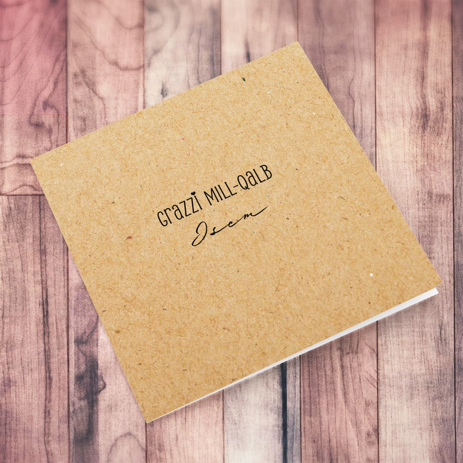 A minimalist open thank you card on a brown paper background and black text with tiny heart in Maltese (Personalisable & Blank inside)
