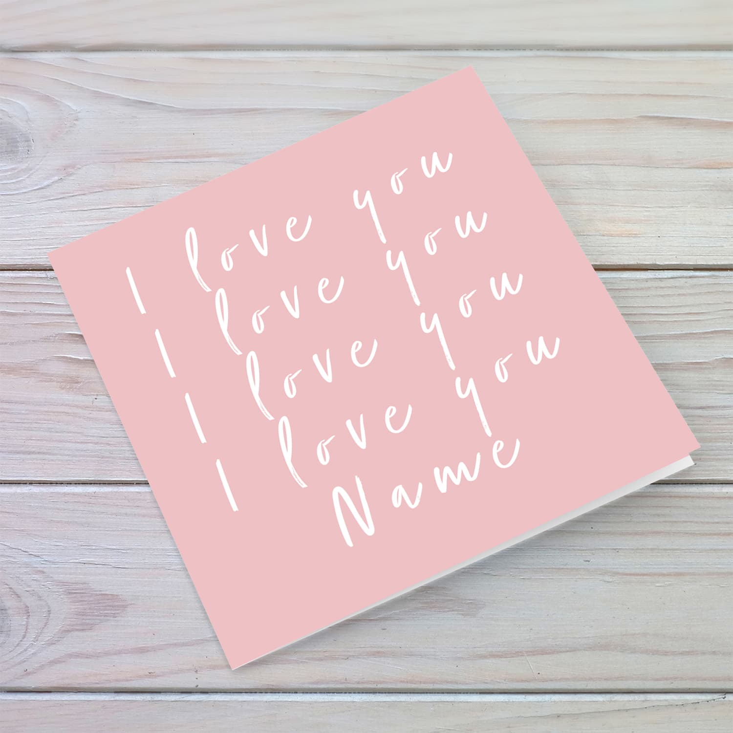 Pink background with white text, repetitive I love you, personalisable Valentine's card in English
