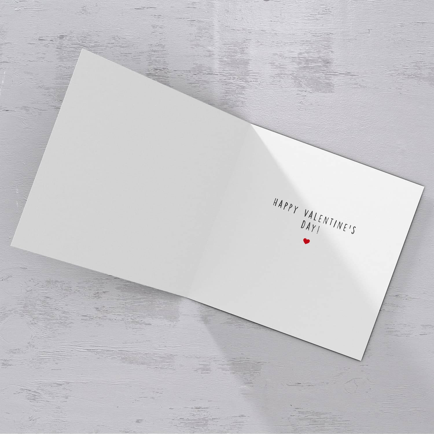 Dark blue/grey background with white text and heart personaliseable Valentine's card in English